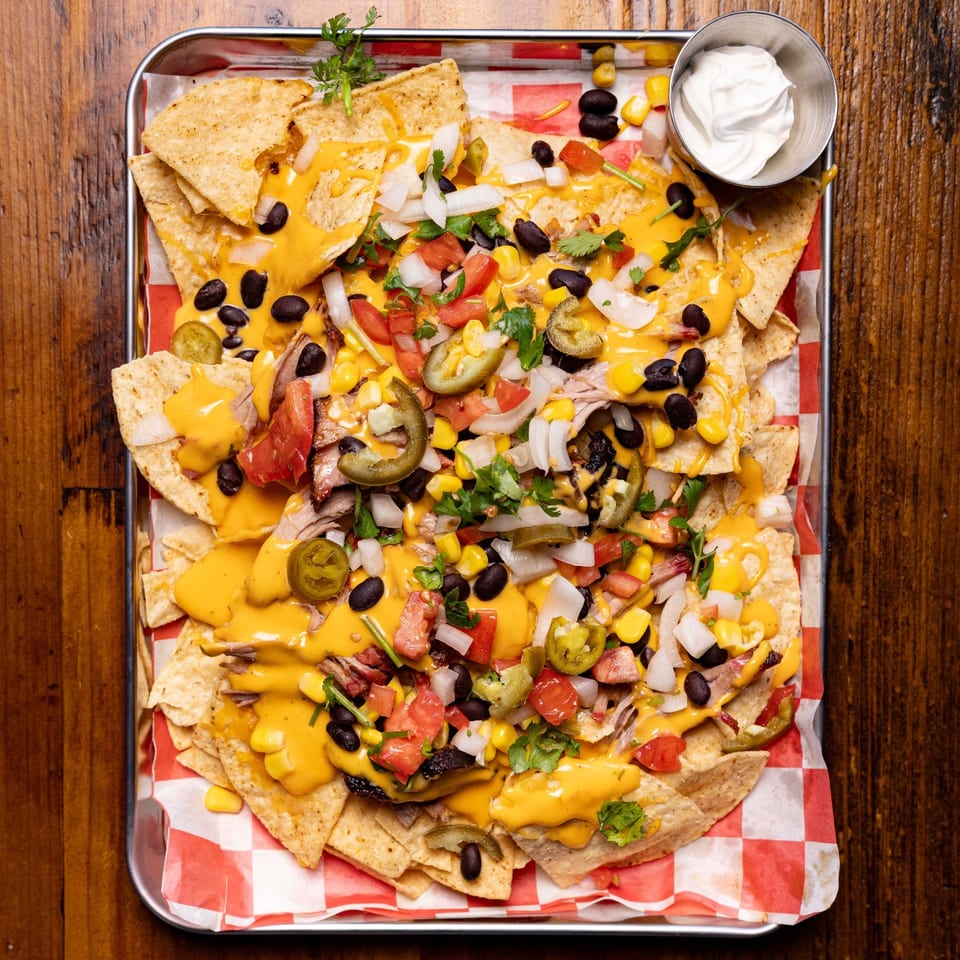 Loaded nachos photographed from above.