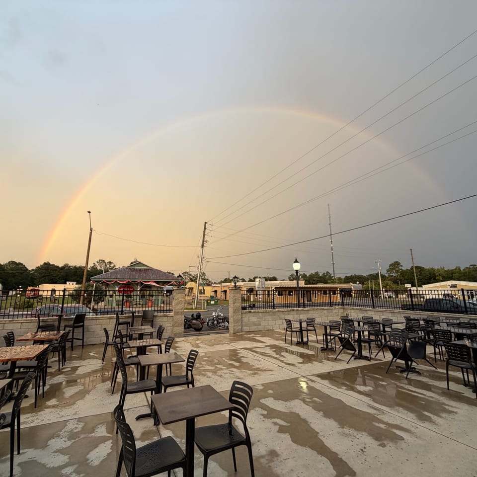 A rainbow above the outdoor patio.